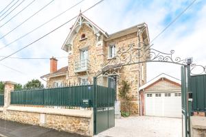 Villas Belle maison de 1912 avec veranda et grand jardin : photos des chambres