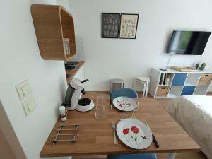 Appartements Studio Cosy neuf + lit bebe a 4 minutes RER A : photos des chambres