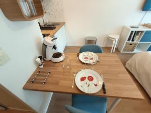 Appartements Studio Cosy neuf + lit bebe a 4 minutes RER A : photos des chambres