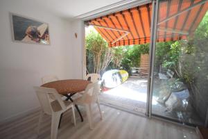 Appartements jardin plage avec 2 paddles, du calme et de l'ombre : photos des chambres