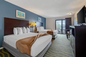 Quadruple Room with Two Queen Beds and Balcony - Non Smoking room in Atlantis Waterpark Hotel
