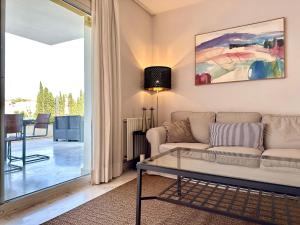 Blue House in Guadalmina Baja, with a large terrace overlooking the Golf