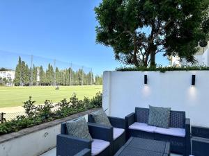 Blue House in Guadalmina Baja, with a large terrace overlooking the Golf