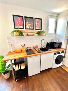 Appartements Le Cocon proche Paris JO 2024 Centre-ville : photos des chambres