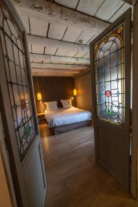 Hotels Art'Hotel & SPA Le Potin Gourmand : photos des chambres