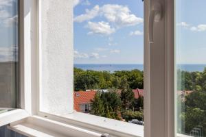 Gdynia Sea View Apartment next to KÄ™pa RedÅ‚owska by Renters