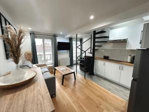 Appartements Charmant duplex proche Paris : photos des chambres