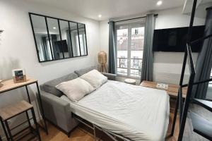 Appartements Charmant duplex proche Paris : photos des chambres