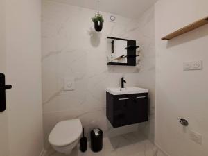 Appartements Camden - Exterieur et parking : photos des chambres