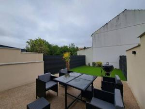 Appartements Camden - Exterieur et parking : photos des chambres