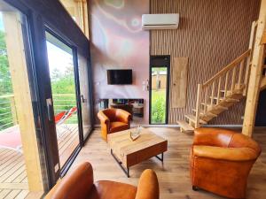 Chalets Cabanes du Domaine des Fees : photos des chambres