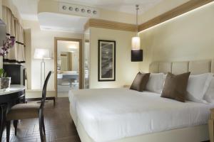 Quadruple Room with Balcony room in Erbavoglio Hotel