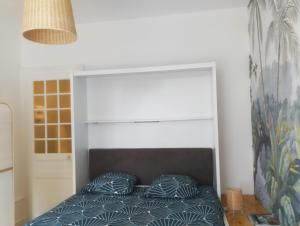 Appartements Studio Hortensia 2 etoiles dans une maison de ville a 400m du centre ville : photos des chambres