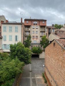 Appartements Studio Carmes,entree autonome,climatise,parking prive payant : photos des chambres