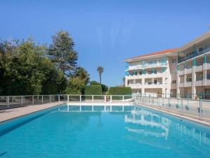 Appartements Situation ideale Piscine Parking Wifi Gare Plage Golf : photos des chambres