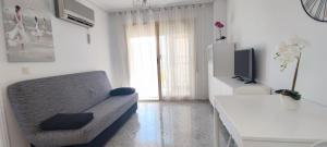 Acogedor apartamento en Daimús a 150 metros de la playa con parking privado y piscinas comunitarias