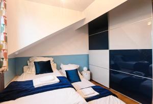 Maisons de vacances House 100m2 with Garden and BBQ 20 min from Paris : photos des chambres