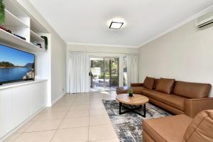 Lake Palm Resort Luxury Retreat absolute Waterfront on 3 acres at Lake Macquarie.