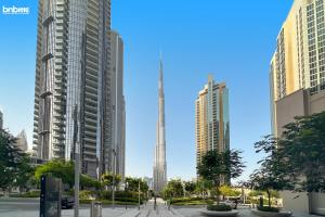 bnbme - Luxury 1BR Apt w Burj Khalifa Views Pool Gym & Prime Location Near Dubai Mall