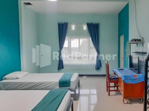 Syariah Safar Guest House Mitra RedDoorz