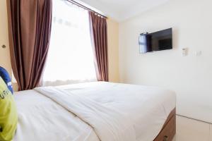 Urbanview Erga Family Residence Syariah Surabaya by RedDoorz