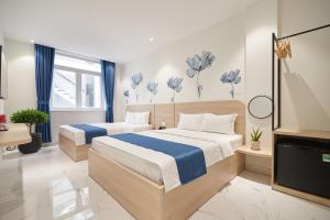 Phòng Hai Giường Đơn Loại Sang (Deluxe Twin Room)