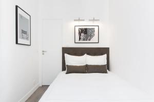 Appartements LivinParis - Luxury 3 Bedrooms Grands-Boulevards I : photos des chambres