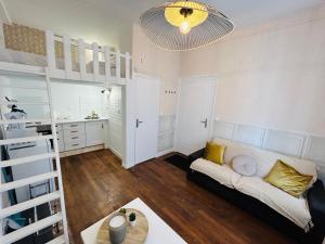 Appartements Le Champagne Coquebert - Centre-ville : photos des chambres