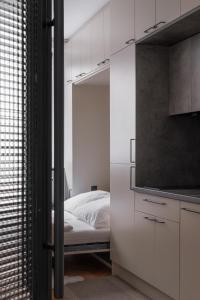 Designer studio with fold-up bed in trendy Žižkov by Prague Days