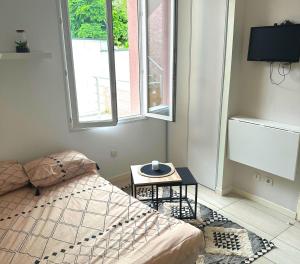 Appartements L'Oasis Cosy : photos des chambres