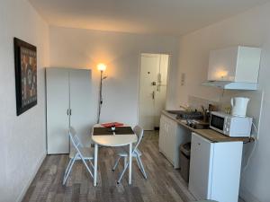 Appartements Studio 30 - Residence Beausejour - Fibre Wi Fi - Proche centre ville : photos des chambres
