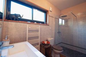 Maisons de vacances L'ecrin des Bois - Nature - Cosy - Parking - Spa : photos des chambres