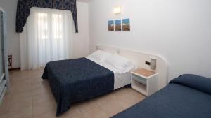 Triple Room with Side Sea View room in Hotel Du Soleil