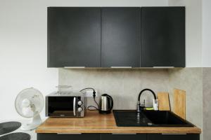 Wygodny apartament niedaleko centrum by Krakow Home