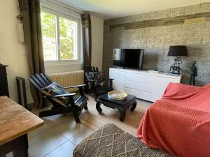 Maisons de vacances Villa Proche bassin + jacuzzi : photos des chambres