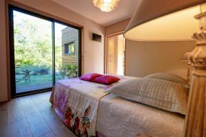 Maisons de vacances L'ecrin des Bois - Nature - Cosy - Parking - Spa : photos des chambres