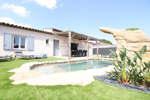 Villas Superbe Villa climatisee, piscine, jardin, parking : photos des chambres