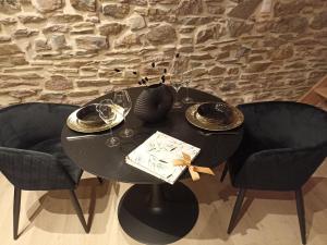 Loft noir (baignoire balnéo et sauna)