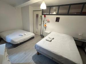 Appartements Hyper centre - wifi - cosy - Gare : photos des chambres