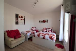 Appartements Les coquelicots Grand Place ARRAS : photos des chambres