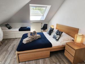 Appartements Akela - Appartement a 12mn de Disneyland Paris ! : photos des chambres