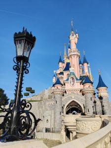 Appartements Akela - Appartement a 12mn de Disneyland Paris ! : photos des chambres