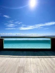 Modern Loft with Rooftop Pool & Steps from the Beach by Solmar Rentals