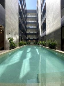 Modern Loft with Rooftop Pool & Steps from the Beach by Solmar Rentals