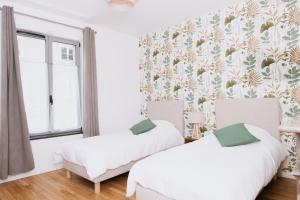 Maisons de vacances Logement coeur de ville : photos des chambres