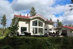 Omakotitalo Vierumäellä X A house near Vierumäki sports center - Vesivehmaa