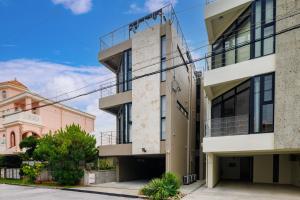 宮城海岸まで3分9名宿泊bbq可能周辺には飲食店多数の北谷エリア セブンヴィレッジ北谷3階 - Ubytování bez kategorie ve městě Čatan