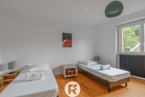 Appartements R'Apparts T4 Urban Loft : photos des chambres