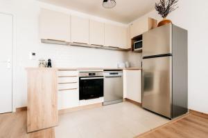 Appartements Elegance Proche Disneyland : photos des chambres