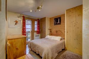 Appartements La Taniere du Grizzly - Appt a Praz-sur-Arly : photos des chambres